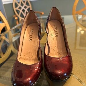 Italian made Anyi Lu ruby red heels. Patent leather with 2 1/2 designer heels.